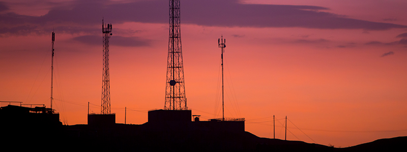 Telecom-towers-against-sunset-amidst-global-chip-shortage